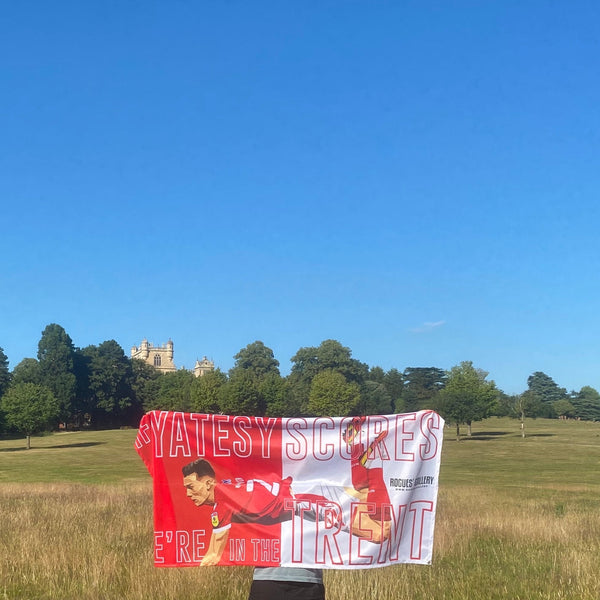 Ryan Yates flag in the Trent red white Nottingham Forest